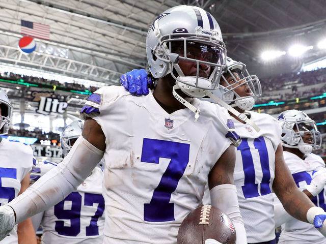 ARLINGTON, TEXAS - OCTOBER 03: Trevon Diggs #7 of the Dallas Cowboys celebrates after an interception during the third quarter against the Carolina Panthers at AT&T Stadium on October 03, 2021 in Arlington, Texas.