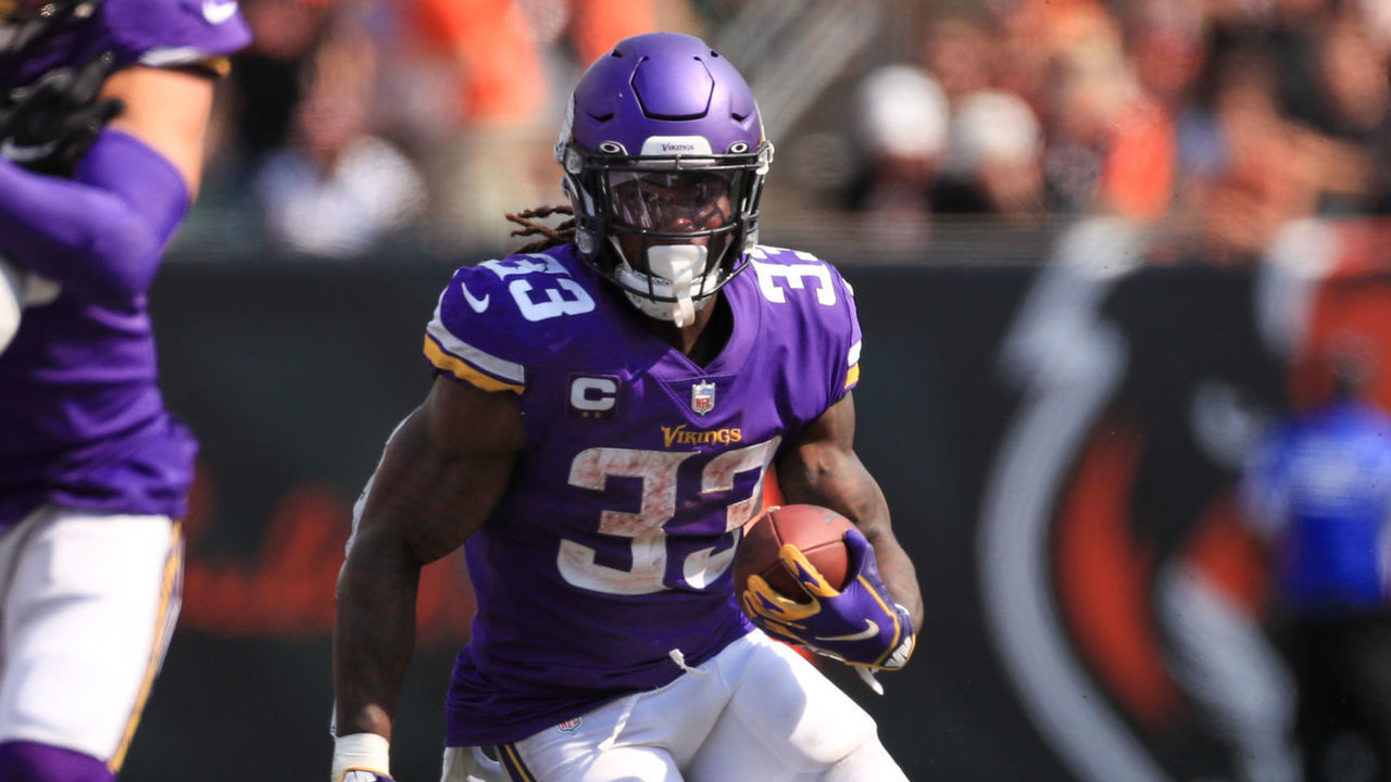 CINCINNATI, OH - SEPTEMBER 12: Minnesota Vikings running back Dalvin Cook (33) carries the ball during the game against the Minnesota Vikings and the Cincinnati Bengals on September 12, 2021, at Paul Brown Stadium in Cincinnati, OH.