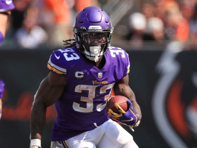CINCINNATI, OH - SEPTEMBER 12: Minnesota Vikings running back Dalvin Cook (33) carries the ball during the game against the Minnesota Vikings and the Cincinnati Bengals on September 12, 2021, at Paul Brown Stadium in Cincinnati, OH.
