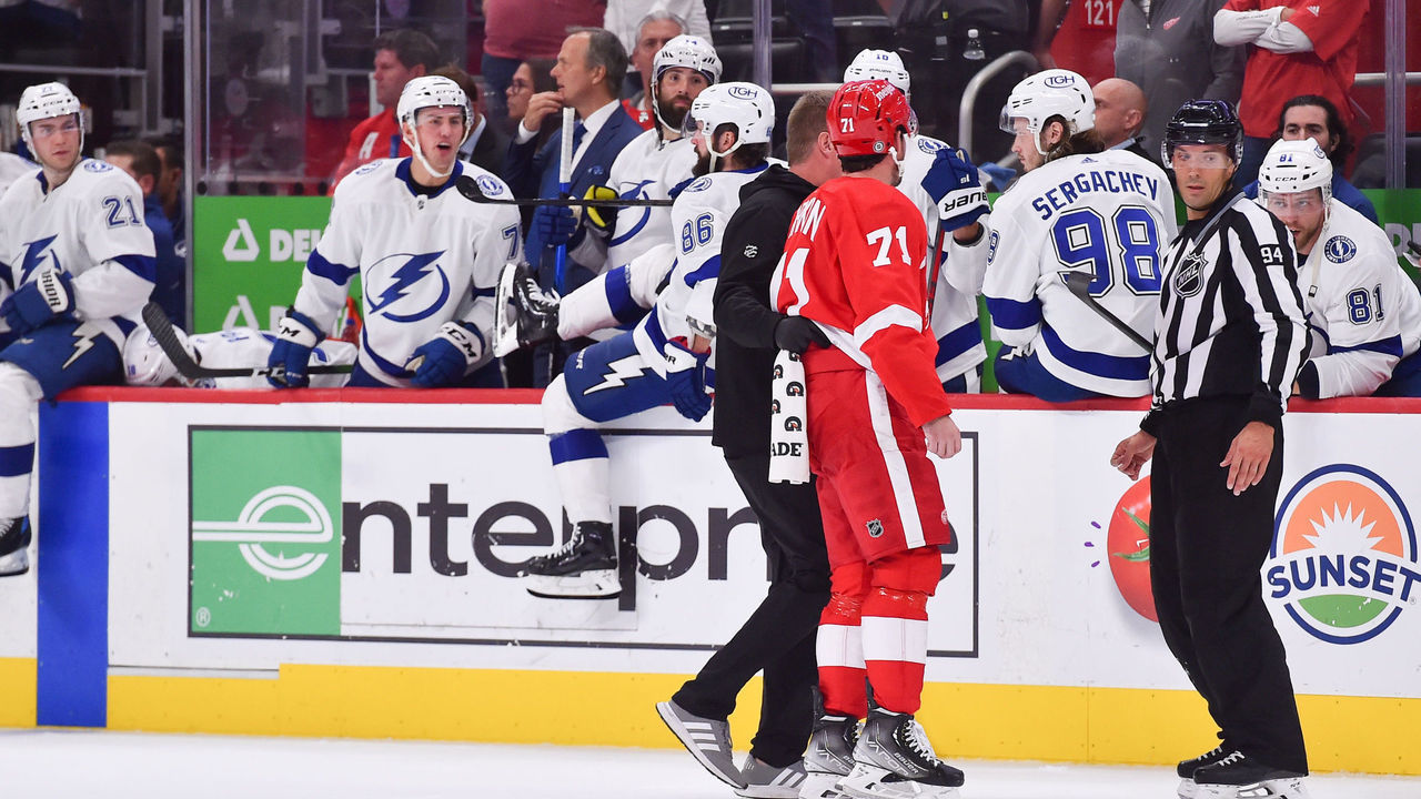 DETROIT, MI - OCTOBER 14: Detroit Red Wings center Dylan Larkin (71) has words with the Tampa Bay Lightning bench after receiving a match penalty during the game between the Detroit Red Wings and the Tampa Bay Lightning on Thursday October 14, 2021 at Little Caesars Arena Center in Detroit, MI.