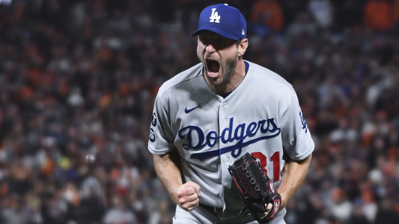 San Francisco, CA - October 14: Los Angeles Dodgers starting pitcher Max Scherzer reacts after striking out San Francisco Giants' Wilmer Flores to end game five of the 2021 National League Division Series at Oracle Park on Thursday, Oct. 14, 2021 in San Francisco, CA. The Dodgers won 2-1. (Wally Skalij / Los Angeles Times via Getty Images)