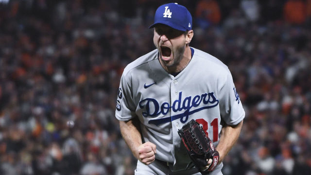 San Francisco, CA - October 14: Los Angeles Dodgers starting pitcher Max Scherzer reacts after striking out San Francisco Giants' Wilmer Flores to end game five of the 2021 National League Division Series at Oracle Park on Thursday, Oct. 14, 2021 in San Francisco, CA. The Dodgers won 2-1. (Wally Skalij / Los Angeles Times via Getty Images)