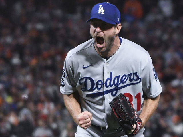 San Francisco, CA - October 14: Los Angeles Dodgers starting pitcher Max Scherzer reacts after striking out San Francisco Giants' Wilmer Flores to end game five of the 2021 National League Division Series at Oracle Park on Thursday, Oct. 14, 2021 in San Francisco, CA. The Dodgers won 2-1. (Wally Skalij / Los Angeles Times via Getty Images)