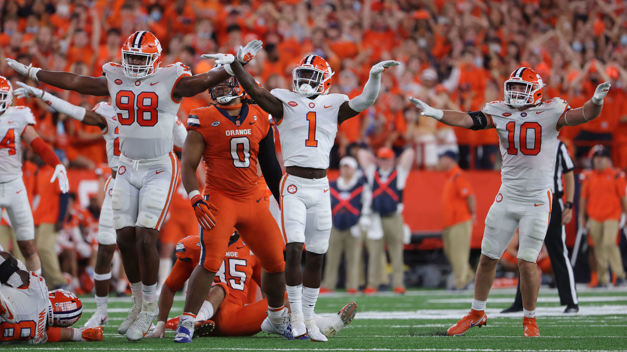 SYRACUSE, NY - OCTOBER 15: Myles Murphy #98 of the Clemson Tigers celebrates a missed field goal with teammates during the second half against the Syracuse Orange at Carrier Dome on October 15, 2021 in Syracuse, New York.
