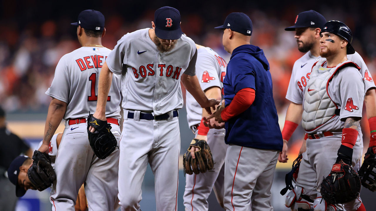 HOUSTON, TEXAS - OCTOBER 15: Chris Sale #41 of the Boston Red Sox is taken out of the game by manager Alex Cora in the third inning against the Houston Astros during Game One of the American League Championship Series at Minute Maid Park on October 15, 2021 in Houston, Texas.