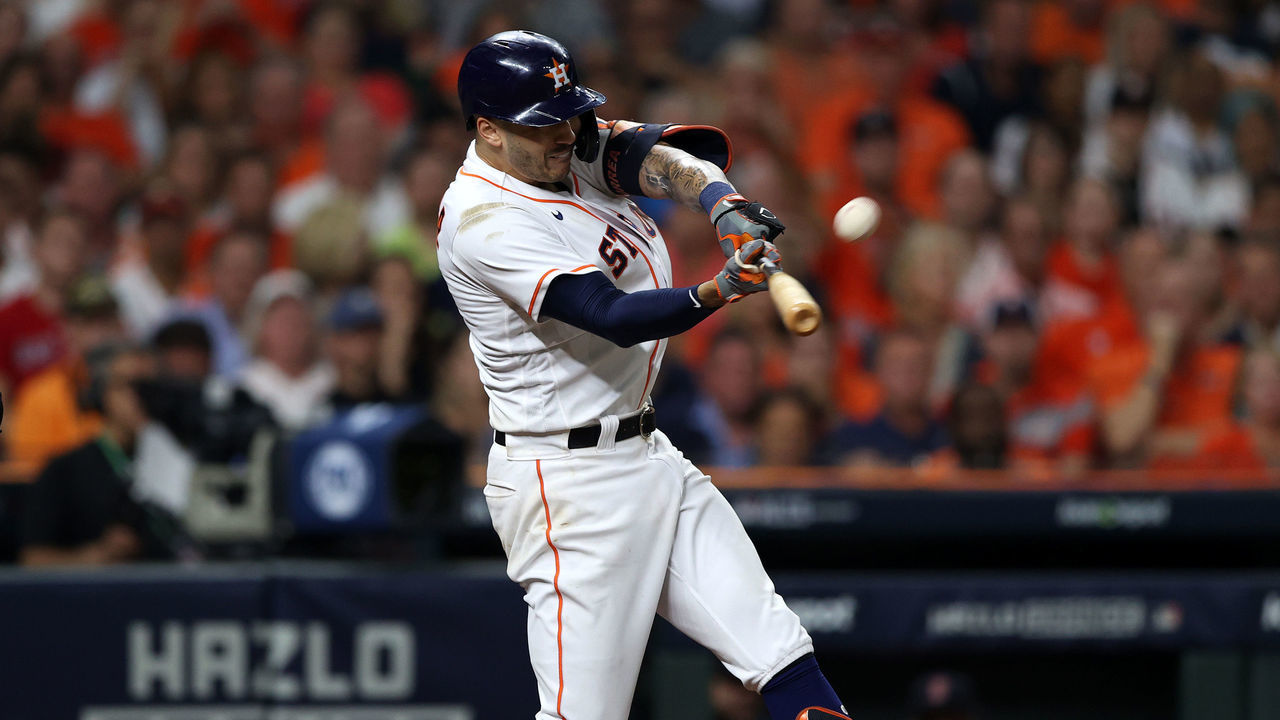 HOUSTON, TEXAS - OCTOBER 15: Carlos Correa #1 of the Houston Astros hits a home run in the seventh inning against the Boston Red Sox during Game One of the American League Championship Series at Minute Maid Park on October 15, 2021 in Houston, Texas.