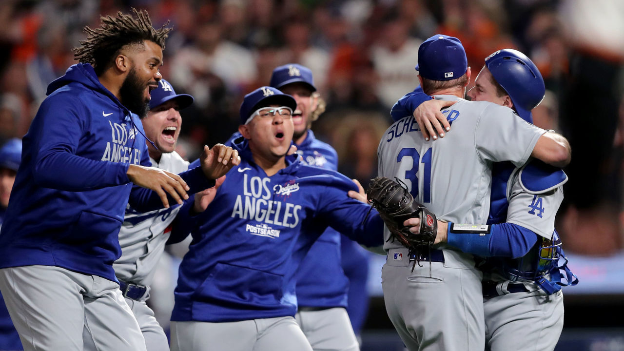 SAN FRANCISCO, CA - OCTOBER 14: Los Angeles Dodgers celebrate their 2-1 win against the San Francisco Giants of Game 5 of the National League Divisional Series at Oracle Park in San Francisco, Calif., on Thursday, Oct. 14, 2021.