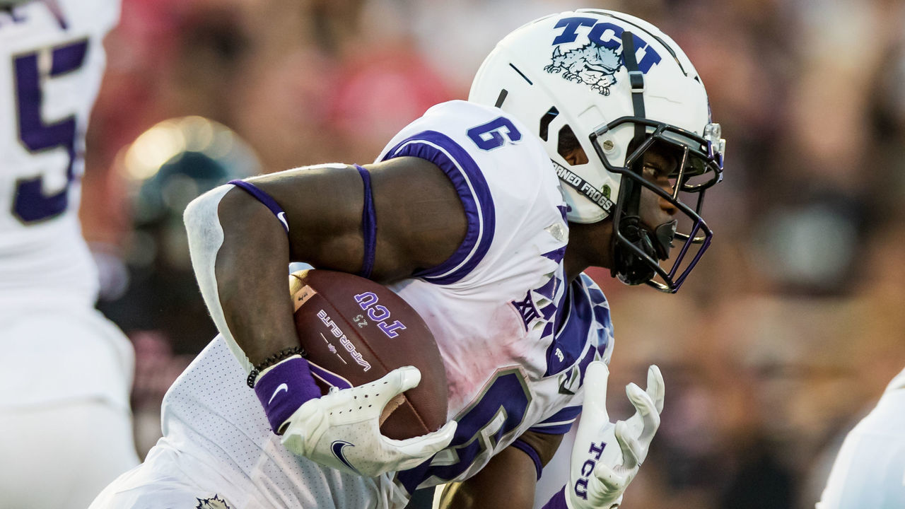 LUBBOCK, TEXAS - OCTOBER 09: Running back Zach Evans #6 of the TCU Horned Frogs runs the ball during the first half of the college football game against the Texas Tech Red Raiders at Jones AT&T Stadium on October 09, 2021 in Lubbock, Texas.