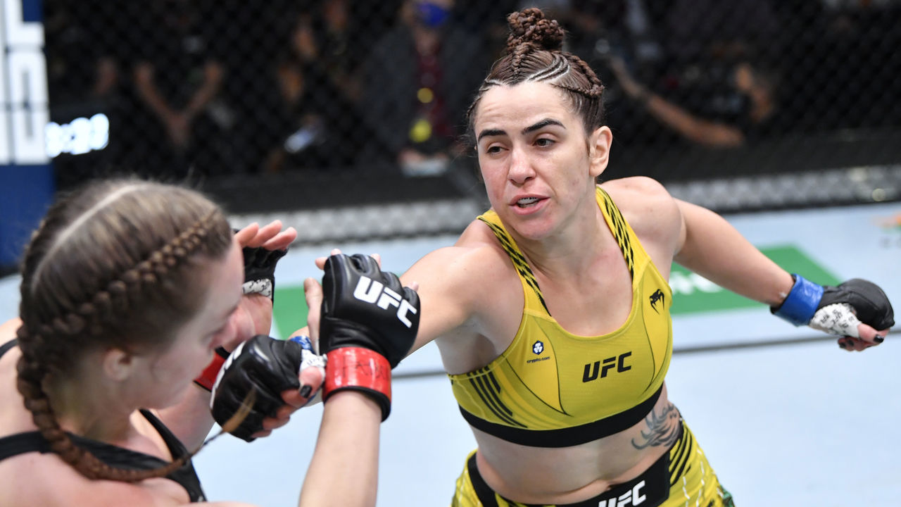 LAS VEGAS, NEVADA - OCTOBER 16: (R-L) Norma Dumont of Brazil punches Aspen Ladd in a featherweight fight during the UFC Fight Night event at UFC APEX on October 16, 2021 in Las Vegas, Nevada.