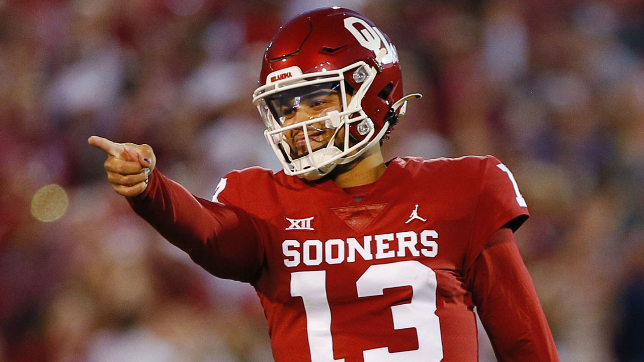 NORMAN, OK - OCTOBER 16: Quarterback Caleb Williams #13 of the Oklahoma Sooners points to tight end Jeremiah Hall after throwing a pass to connect for the second touchdown of the game against the Texas Christian University Horned Frogs at Gaylord Family Oklahoma Memorial Stadium on October 16, 2021 in Norman, Oklahoma.
