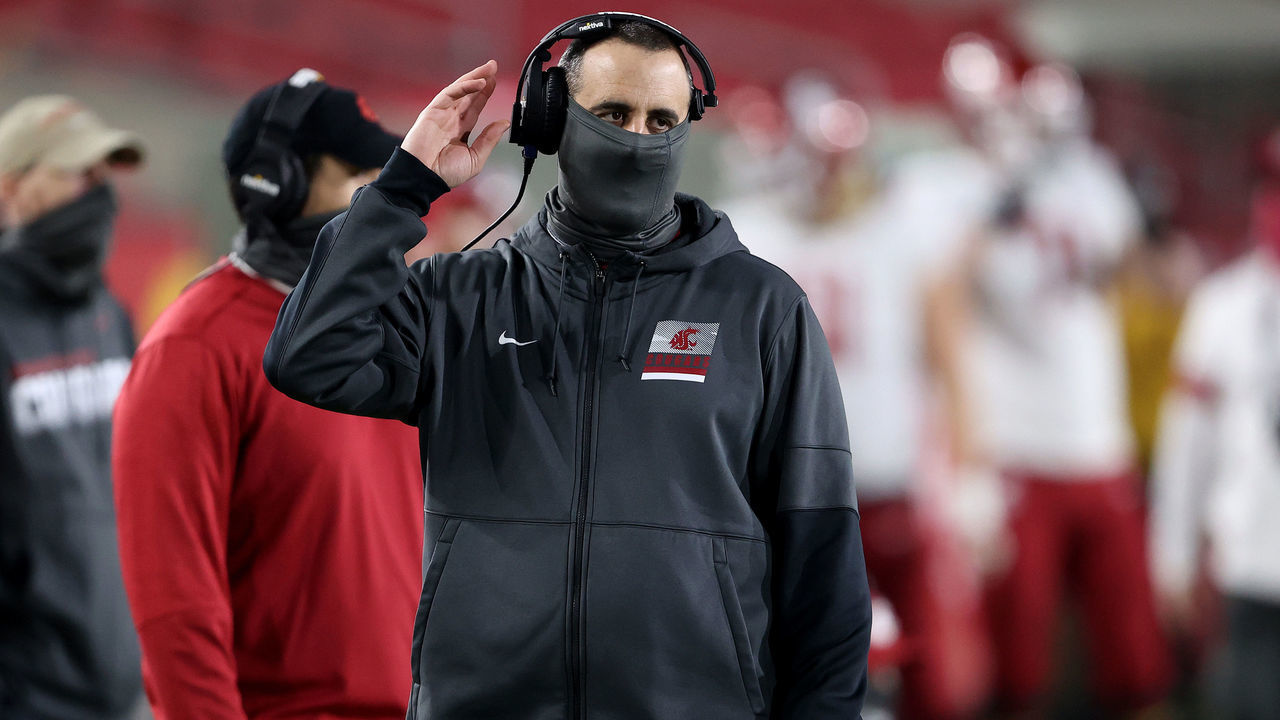 LOS ANGELES, CALIFORNIA - DECEMBER 06: Head coach Nick Rolovich of the Washington State Cougars looks on during the second half of a game against the USC Trojans at Los Angeles Coliseum on December 06, 2020 in Los Angeles, California.