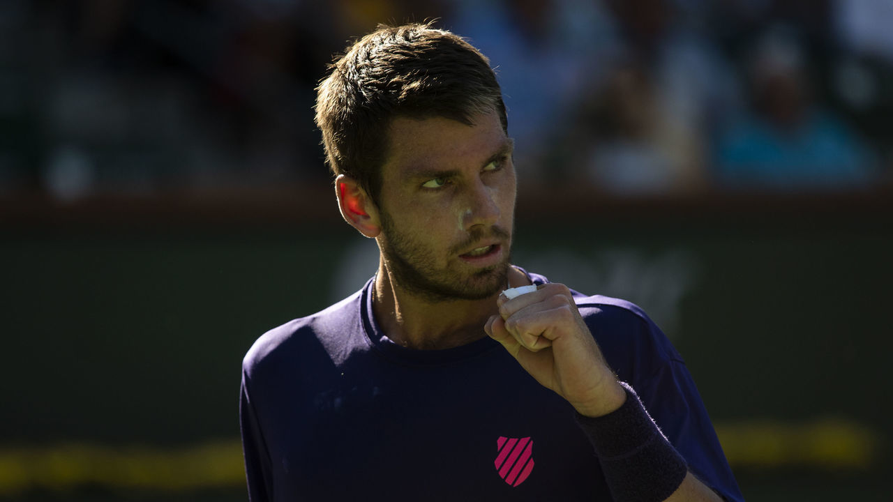 INDIAN WELLS, CALIFORNIA - OCTOBER 16: Cameron Norrie of Great Britain celebrates his victory over Grigor Dimitrov of Bulgaria in the semifinal of the BNP Paribas Open at the Indian Wells Tennis Garden on October 16, 2021 in Indian Wells, California.