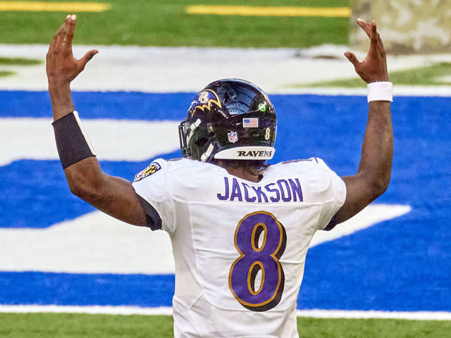 INDIANAPOLIS, IN - NOVEMBER 08: Baltimore Ravens quarterback Lamar Jackson (8) celebrates after a touchdown play in action during a NFL game between the Indianapolis Colts and the Baltimore Ravens on November 08, 2020 at Lucas Oil Stadium in Indianapolis, IN.