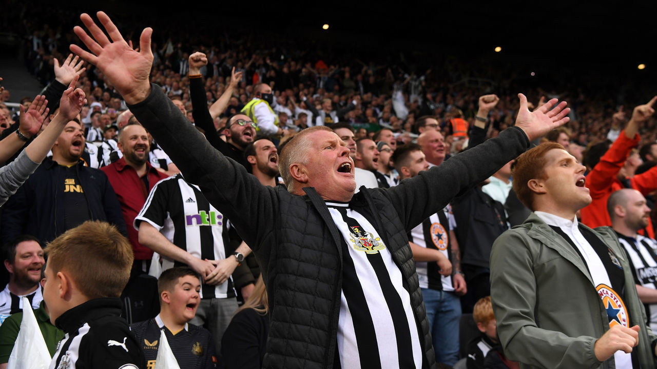 NEWCASTLE UPON TYNE, ENGLAND - OCTOBER 17: Fans of Newcastle United show their support during the Premier League match between Newcastle United and Tottenham Hotspur at St. James Park on October 17, 2021 in Newcastle upon Tyne, England.