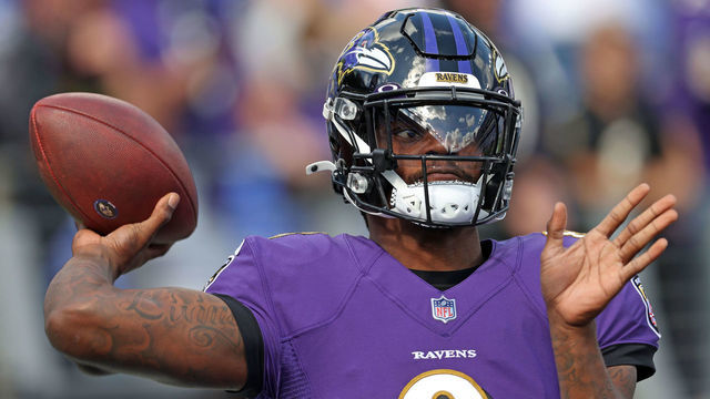 BALTIMORE, MARYLAND - OCTOBER 17: Lamar Jackson #8 of the Baltimore Ravens warms up prior to the game against the Los Angeles Chargers at M&T Bank Stadium on October 17, 2021 in Baltimore, Maryland.
