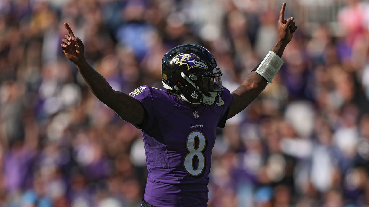 BALTIMORE, MARYLAND - OCTOBER 17: Lamar Jackson #8 of the Baltimore Ravens celebrates a touchdown against the Los Angeles Chargers during the fourth quarter at M&T Bank Stadium on October 17, 2021 in Baltimore, Maryland.