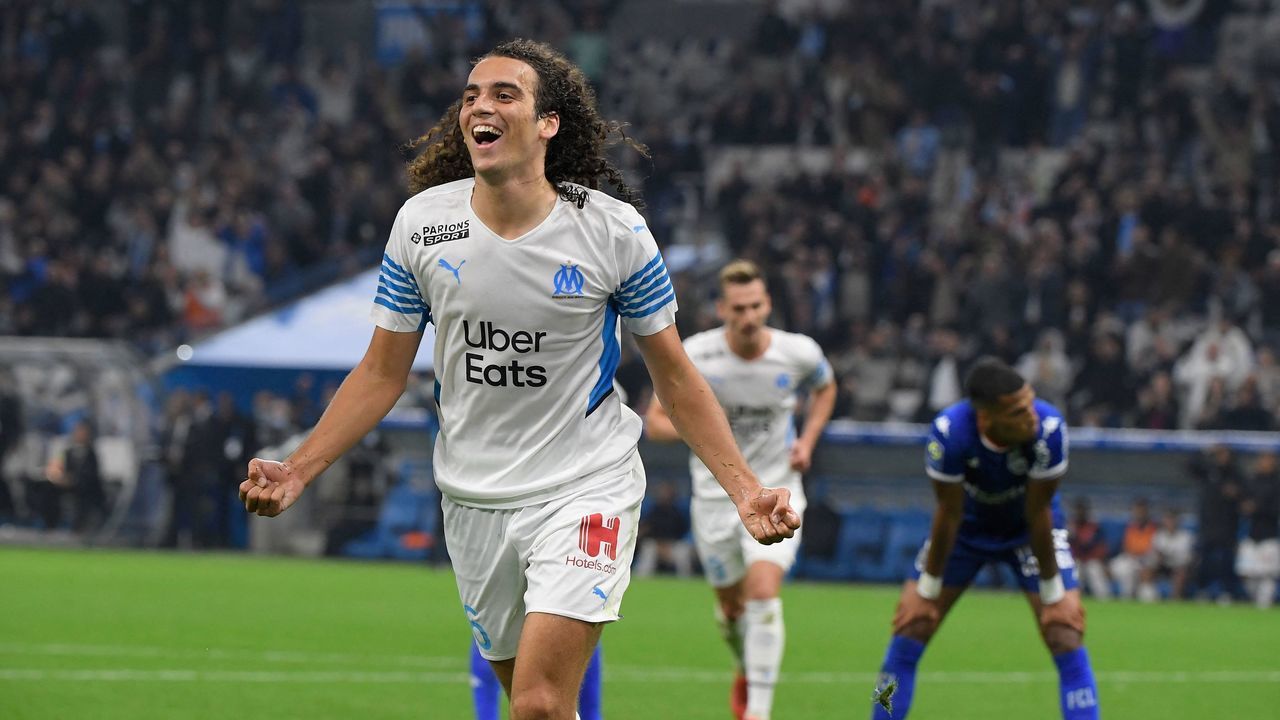 Marseille's French defender Matteo Guendouzi celebrates after scoring a goal during the French L1 football match between Marseille and Lorient on October 17, 2021 at the Velodrome stadium in Marseille.
