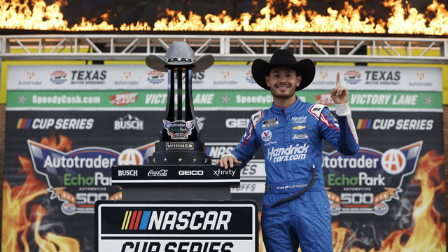 FORT WORTH, TEXAS - OCTOBER 17: Kyle Larson, driver of the #5 HendrickCars.com Chevrolet, celebrates in victory lane after winning the NASCAR Cup Series Autotrader EchoPark Automotive 500 at Texas Motor Speedway on October 17, 2021 in Fort Worth, Texas.
