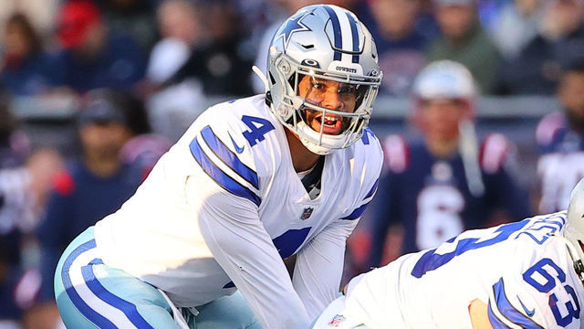 FOXBOROUGH, MA - OCTOBER 17: Dallas Cowboys quarterback Dak Prescott (4) under center during the National Football League game between the New England Patriots and the Dallas Cowboys on October 17, 2021 at Gillette Stadium in Foxborough, MA.