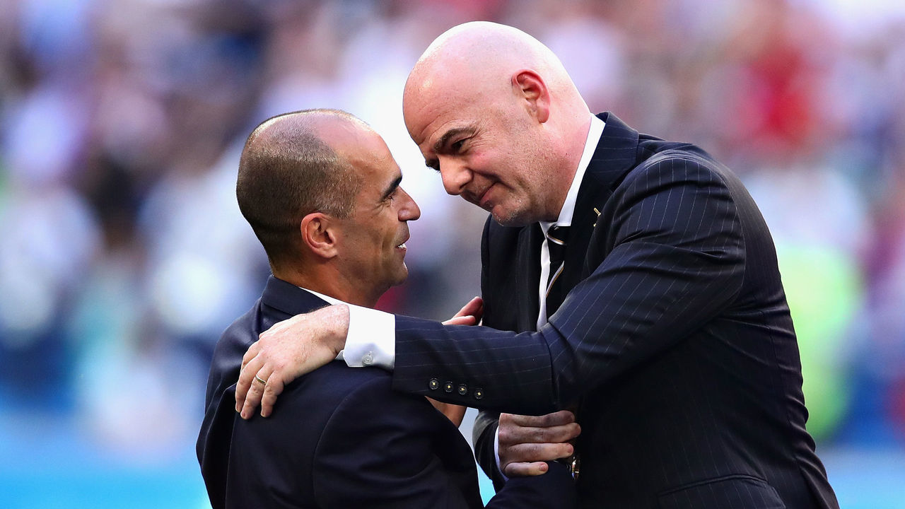 SAINT PETERSBURG, RUSSIA - JULY 14: Head Coach of Belgium Roberto Martinez hugs FIFA President Gianni Infantino after the 2018 FIFA World Cup Russia 3rd Place Playoff match between Belgium and England at Saint Petersburg Stadium on July 14, 2018 in Saint Petersburg, Russia.