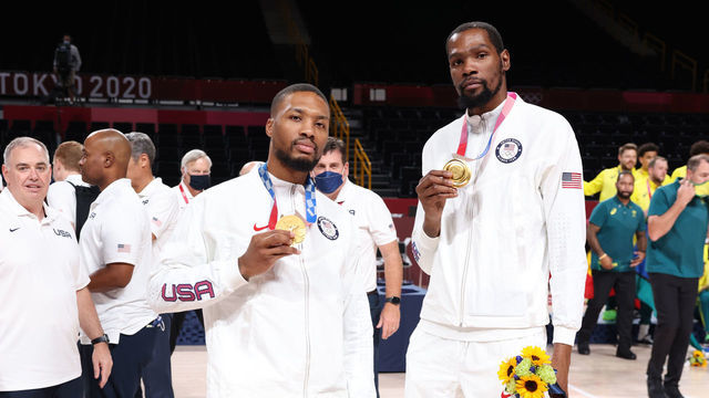 TOKYO, JAPAN - AUGUST 7: Damian Lillard #6 and Kevin Durant #7 of the USA Men's National Team pose for a picture during the Medal Ceremony of the 2020 Tokyo Olympics at the Saitama Super Arena on August 7, 2021 in Tokyo, Japan. NOTE TO USER: User expressly acknowledges and agrees that, by downloading and/or using this Photograph, user is consenting to the terms and conditions of the Getty Images License Agreement. Mandatory Copyright Notice: Copyright 2021 NBAE
