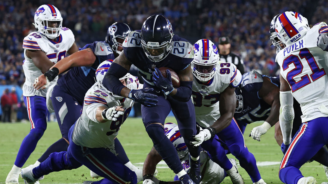 NASHVILLE, TENNESSEE - OCTOBER 18: Running back Derrick Henry #22 of the Tennessee Titans scores a touchdown against the Buffalo Bills during the third quarter at Nissan Stadium on October 18, 2021 in Nashville, Tennessee.