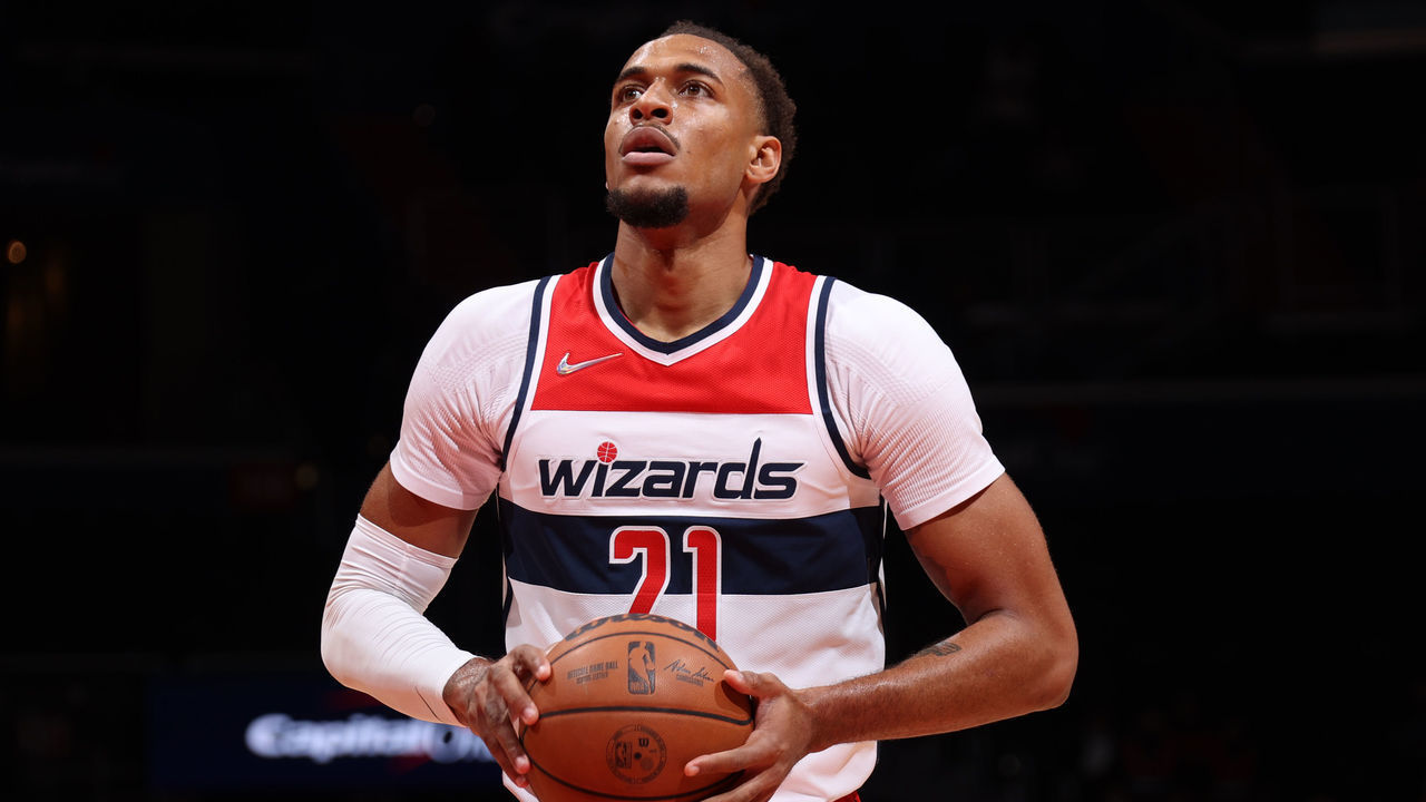 WASHINGTON, DC - OCTOBER 12: Daniel Gafford #21 of the Washington Wizards shoots a free throw during a preseason game against the Toronto Raptors on October 12, 2021 at Capital One Arena in Washington, DC. Mandatory Copyright Notice: Copyright 2021 NBAE