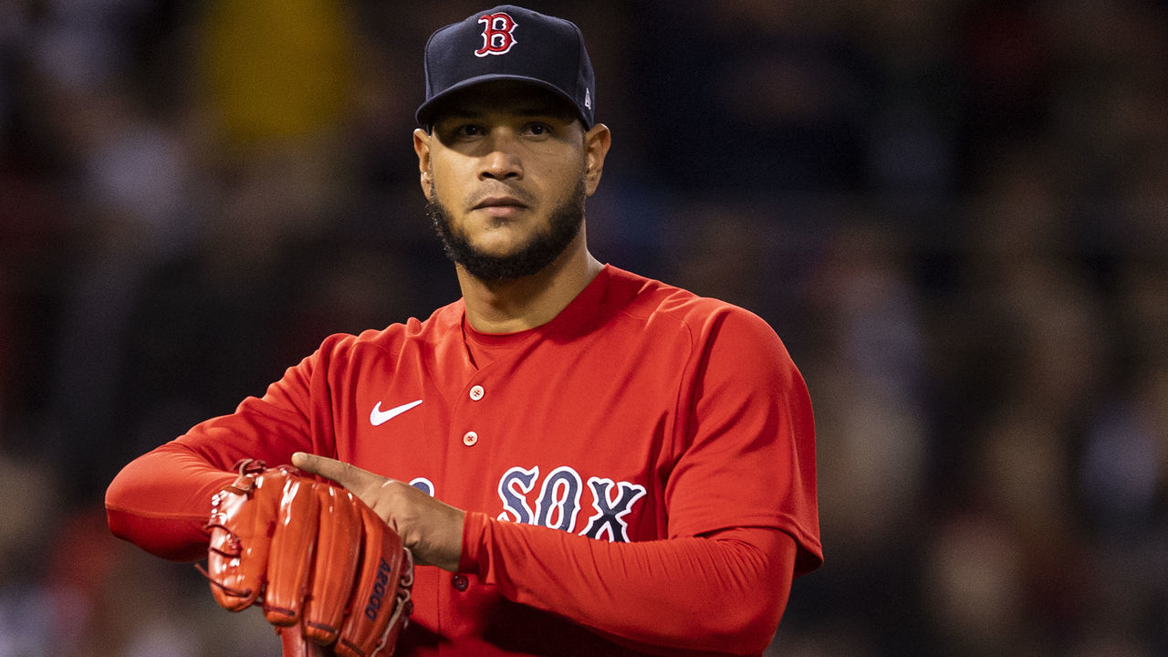BOSTON, MA - OCTOBER 18: Eduardo Rodriguez #57 of the Boston Red Sox reacts during the sixth inning of game three of the 2021 American League Championship Series against the Houston Astros at Fenway Park on October 18, 2021 in Boston, Massachusetts.