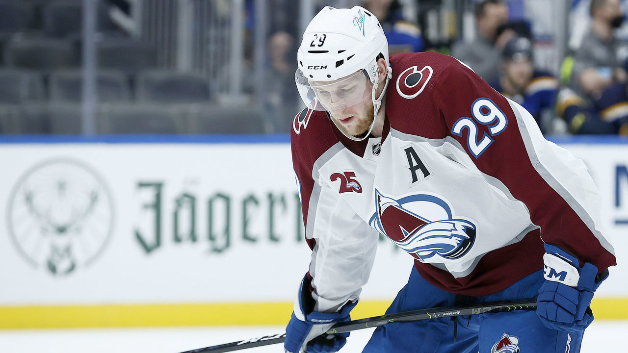 ST LOUIS, MISSOURI - MAY 23: Nathan MacKinnon #29 of the Colorado Avalanche regroups after taking a stick to the face against the St. Louis Blues in the third period at Enterprise Center on May 23, 2021 in St Louis, Missouri.