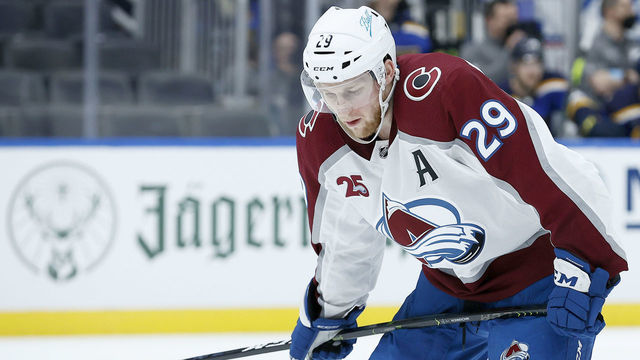 ST LOUIS, MISSOURI - MAY 23: Nathan MacKinnon #29 of the Colorado Avalanche regroups after taking a stick to the face against the St. Louis Blues in the third period at Enterprise Center on May 23, 2021 in St Louis, Missouri.
