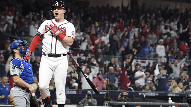 Atlanta, GA - October 17: Atlanta Braves right fielder Joc Pederson reacts after hitting a two-run home run during the fourth inning in game two in the 2021 National League Championship Series against the Los Angeles Dodgers at Truist Park on Sunday, Oct. 17, 2021 in Atlanta, GA. The Braves won 5-4. (Wally Skalij / Los Angeles Times via Getty Images)