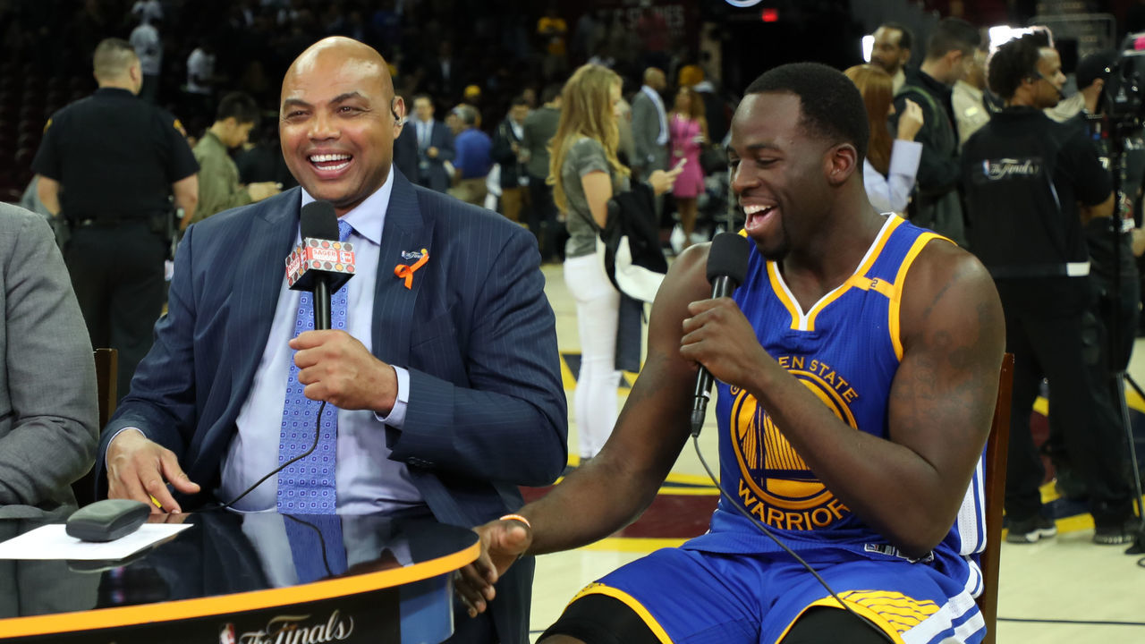 CLEVELAND, OH - JUNE 7: Chris Webber and Charles Barkley of NBA TV chats with Draymond Green of the Golden State Warriors after the game against the Cleveland Cavaliers in Game Three of the 2017 NBA Finals on June 7, 2017 at Quicken Loans Arena in Cleveland, Ohio. NOTE TO USER: User expressly acknowledges and agrees that, by downloading and or using this photograph, user is consenting to the terms and conditions of Getty Images License Agreement. Mandatory Copyright Notice: Copyright 2017 NBAE