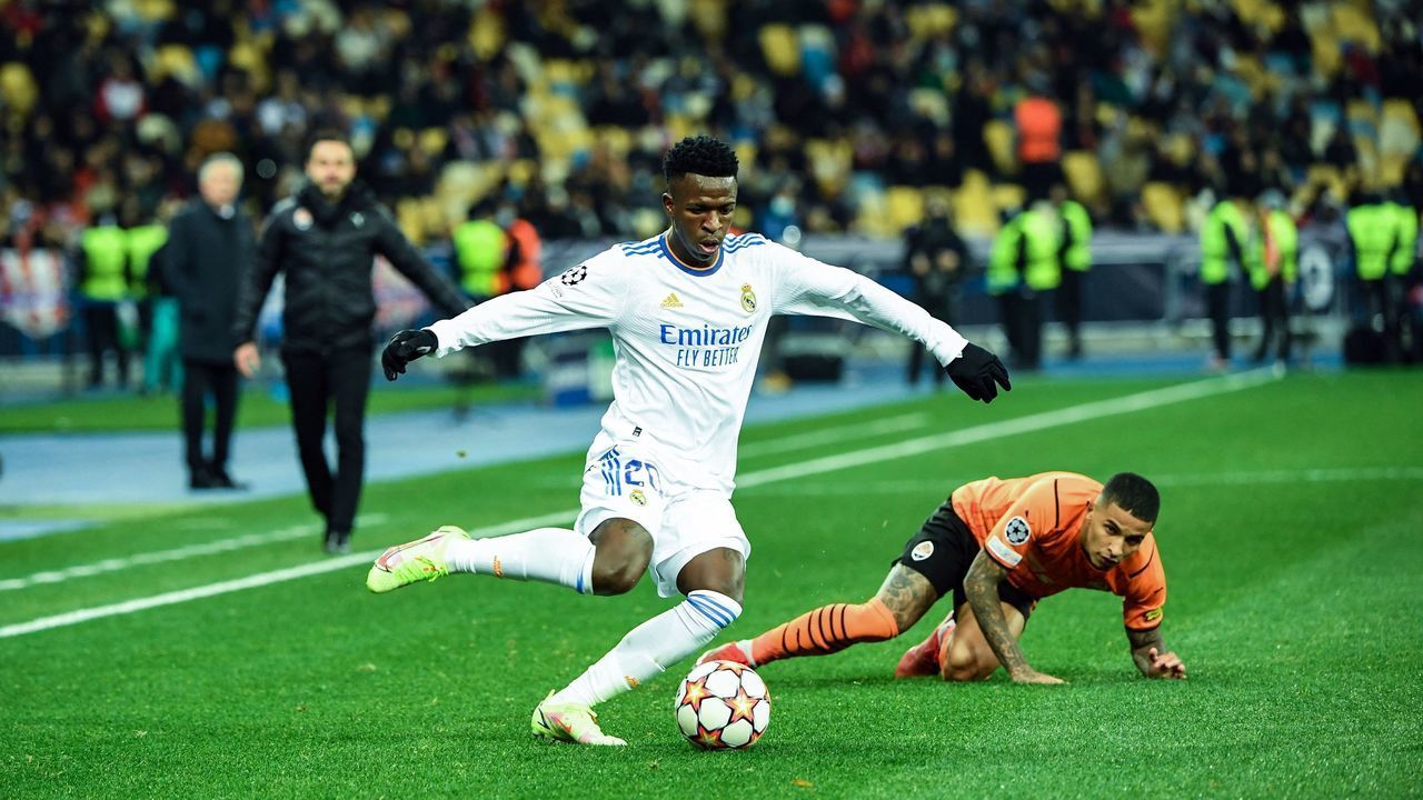 Real Madrid's Brazilian forward Vinicius Junior in action during the UEFA Champions League football match between Shakhtar Donetsk and Real Madrid at the Olympic Stadium in Kiev on October 19, 2021.