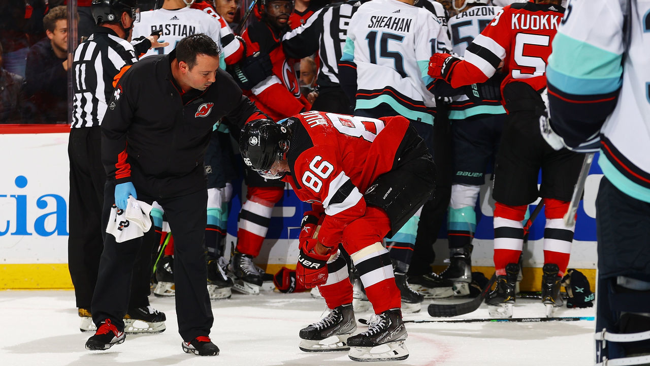 NEWARK, NEW JERSEY - OCTOBER 19: Jack Hughes #86 of the New Jersey Devils skates off the ice after getting hit against the Seattle Kraken at Prudential Center on October 19, 2021 in Newark, New Jersey.