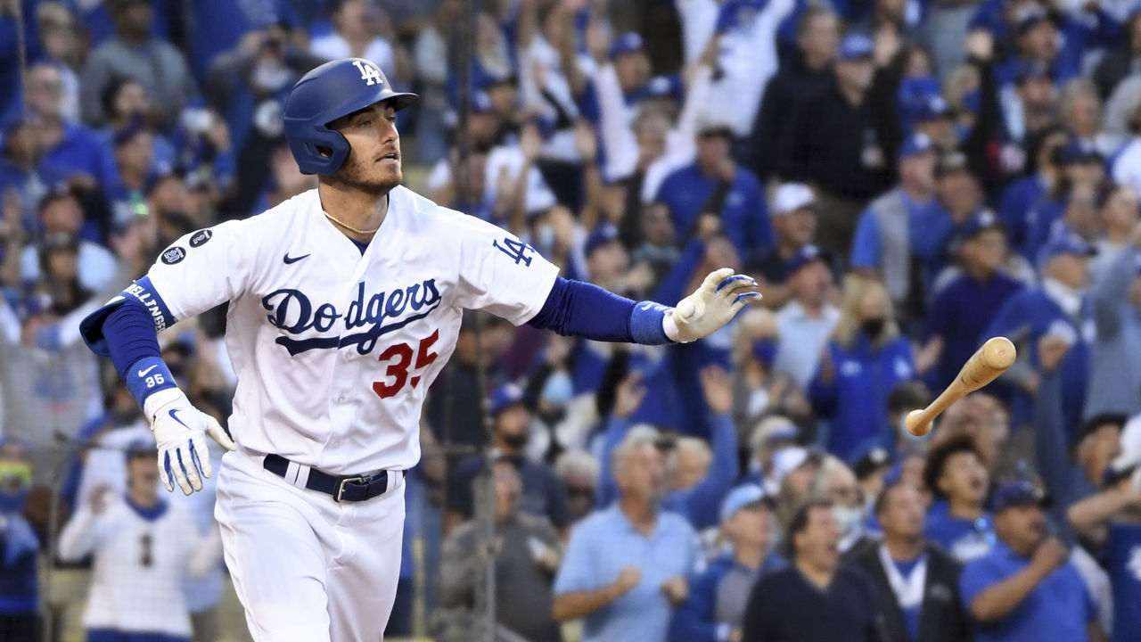 Los Angeles, CA - October 19: Los Angeles Dodgers' Cody Bellinger tosses his bat after hitting the game-tying three-run home run during the eighth inning in game three in the 2021 National League Championship Series against the Atlanta Braves at Dodger Stadium on Tuesday, Oct. 19, 2021 in Los Angeles, CA. (Wally Skalij / Los Angeles Times via Getty Images)