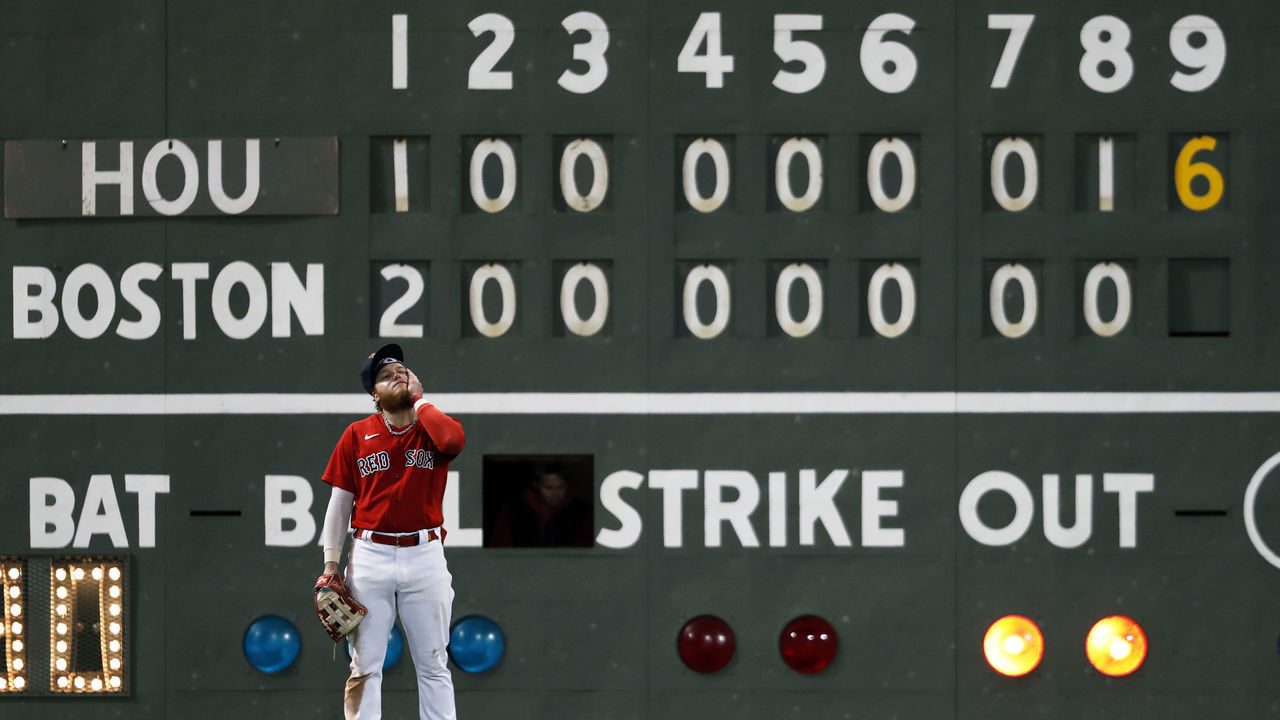 Boston - October 19: Red Sox LF Alex Verdugo reacts after the Astros had just scored their 7th run of the ninth inning. The Boston Red Sox host the Tampa Bay Rays in Game 4 of the ALCS at Fenway Park in Boston on Oct. 19, 2021.