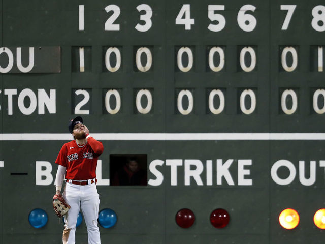 Boston - October 19: Red Sox LF Alex Verdugo reacts after the Astros had just scored their 7th run of the ninth inning. The Boston Red Sox host the Tampa Bay Rays in Game 4 of the ALCS at Fenway Park in Boston on Oct. 19, 2021.