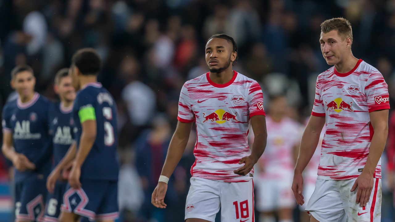 PARIS, FRANCE - OCTOBER 19: (BILD OUT) Christopher Nkunku of RB Leipzig and Willi Orban of RB Leipzig look dejected during the UEFA Champions League group A match between Paris Saint-Germain and RB Leipzig at Parc des Princes on October 19, 2021 in Paris, France.