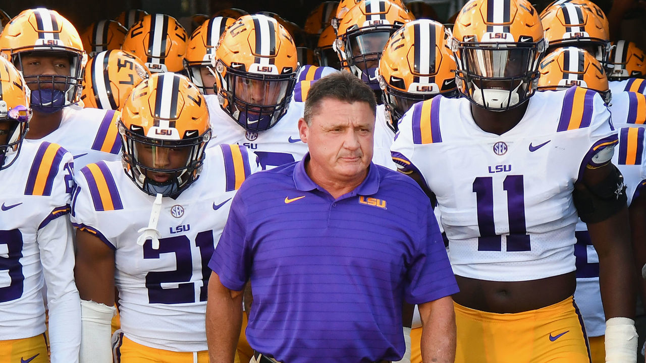 PASADENA, CA - SEPTEMBER 04: LSU Tigers Head Coach Ed Orgeron leads his team onto the field before the start of a game against the UCLA Bruins played on September 4, 2021 at the Rose Bowl in Pasadena, CA.