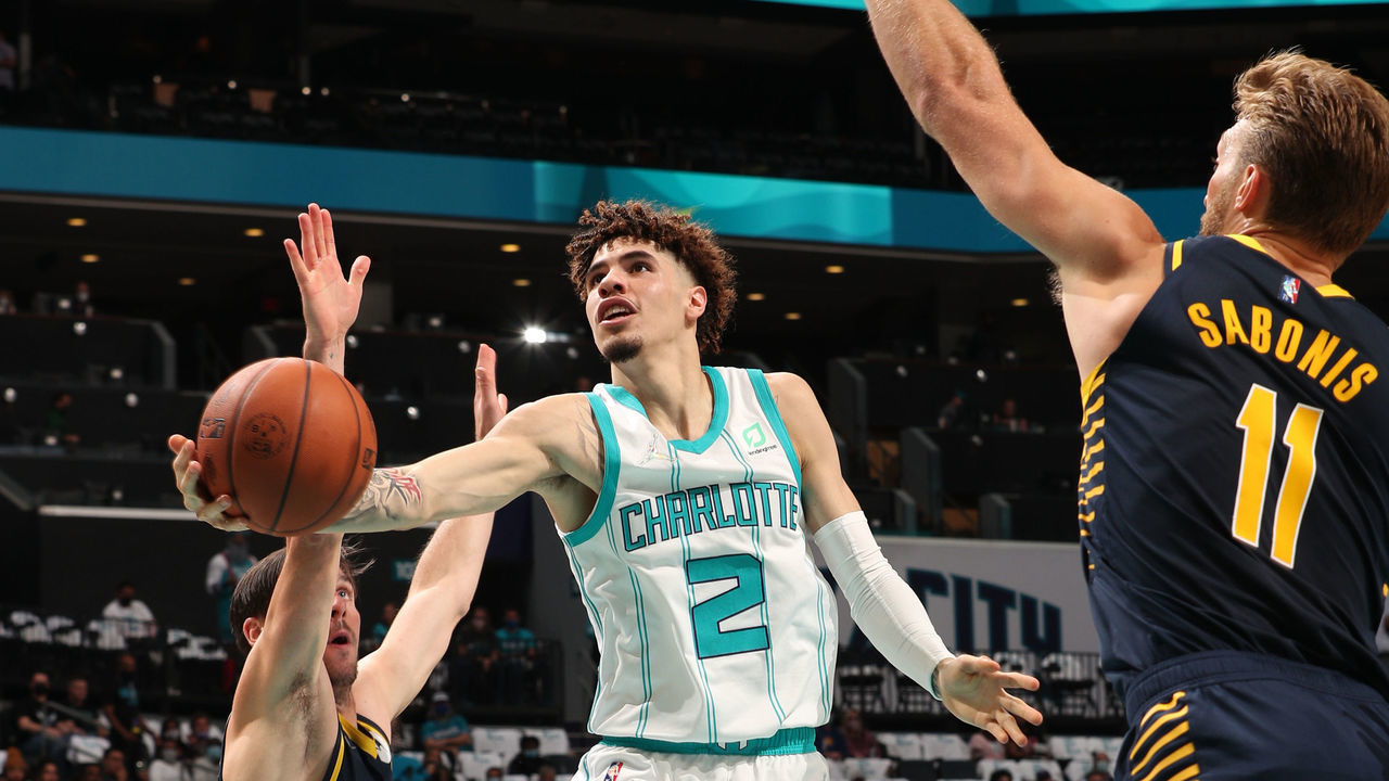 CHARLOTTE, NC - OCTOBER 20: LaMelo Ball #2 of the Charlotte Hornets drives to the basket during the game against the Indiana Pacers on October 20, 2021 at Spectrum Center in Charlotte, North Carolina. Mandatory Copyright Notice: Copyright 2021 NBAE