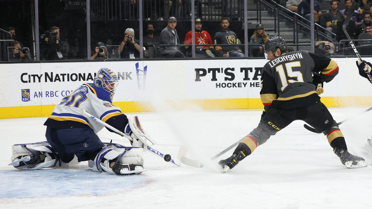 LAS VEGAS, NEVADA - OCTOBER 20: Jordan Binnington #50 of the St. Louis Blues blocks a shot by Jake Leschyshyn #15 of the Vegas Golden Knights in the second period of their game at T-Mobile Arena on October 20, 2021 in Las Vegas, Nevada.