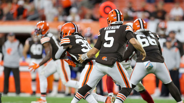 CLEVELAND, OH - OCTOBER 17: Cleveland Browns running back D'Ernest Johnson (30) takes a handoff from Cleveland Browns quarterback Case Keenum (5) during the fourth quarter of the National Football League game between the Arizona Cardinals and Cleveland Browns on October 17, 2021, at FirstEnergy Stadium in Cleveland, OH.