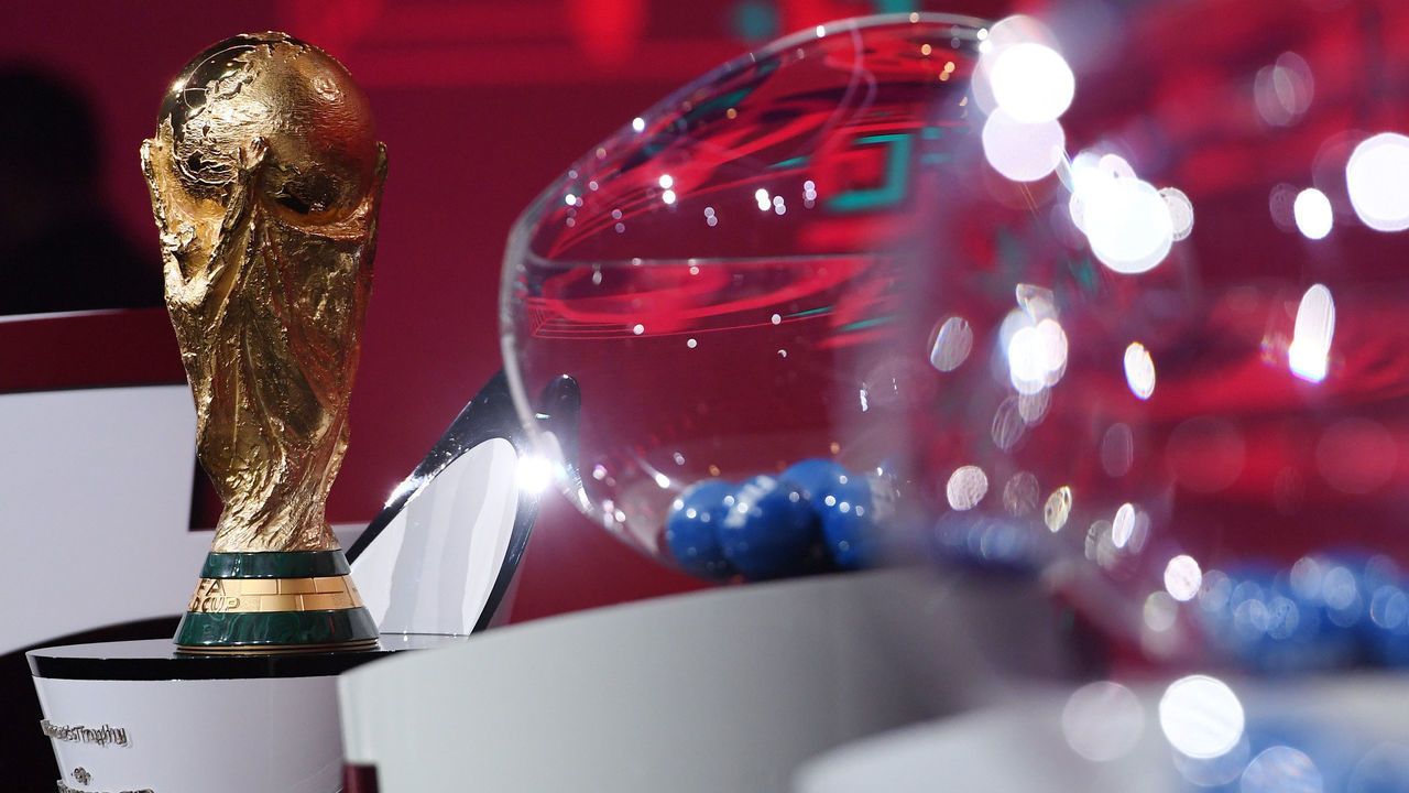 ZURICH, SWITZERLAND - DECEMBER 07: In this handout provided by FIFA, the World Cup Trophy and the draw pot are seen during the Preliminary Draw of the 2022 Qatar FIFA World Cup on December 07, 2020 in Zurich, Switzerland.