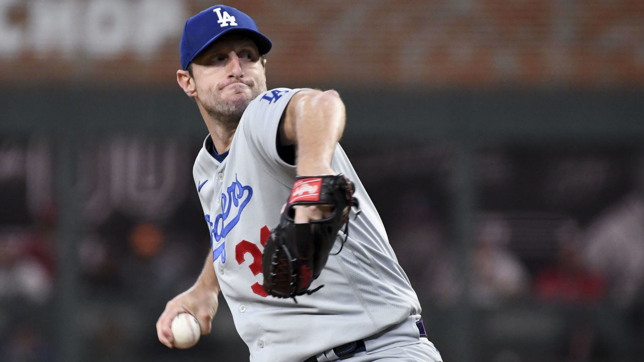 Atlanta, GA - October 17: Los Angeles Dodgers starting pitcher Max Scherzer delivers a pitch during the first inning in game two in the 2021 National League Championship Series against the Atlanta Braves at Truist Park on Sunday, Oct. 17, 2021 in Atlanta, GA.(Wally Skalij / Los Angeles Times via Getty Images)