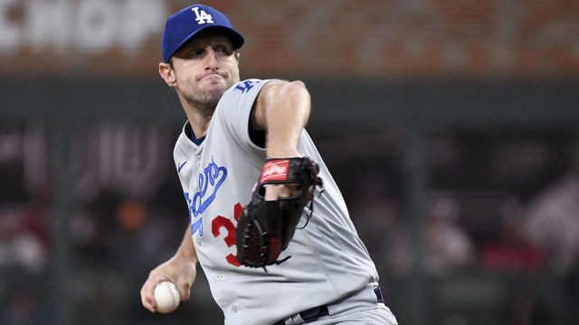 Atlanta, GA - October 17: Los Angeles Dodgers starting pitcher Max Scherzer delivers a pitch during the first inning in game two in the 2021 National League Championship Series against the Atlanta Braves at Truist Park on Sunday, Oct. 17, 2021 in Atlanta, GA.(Wally Skalij / Los Angeles Times via Getty Images)