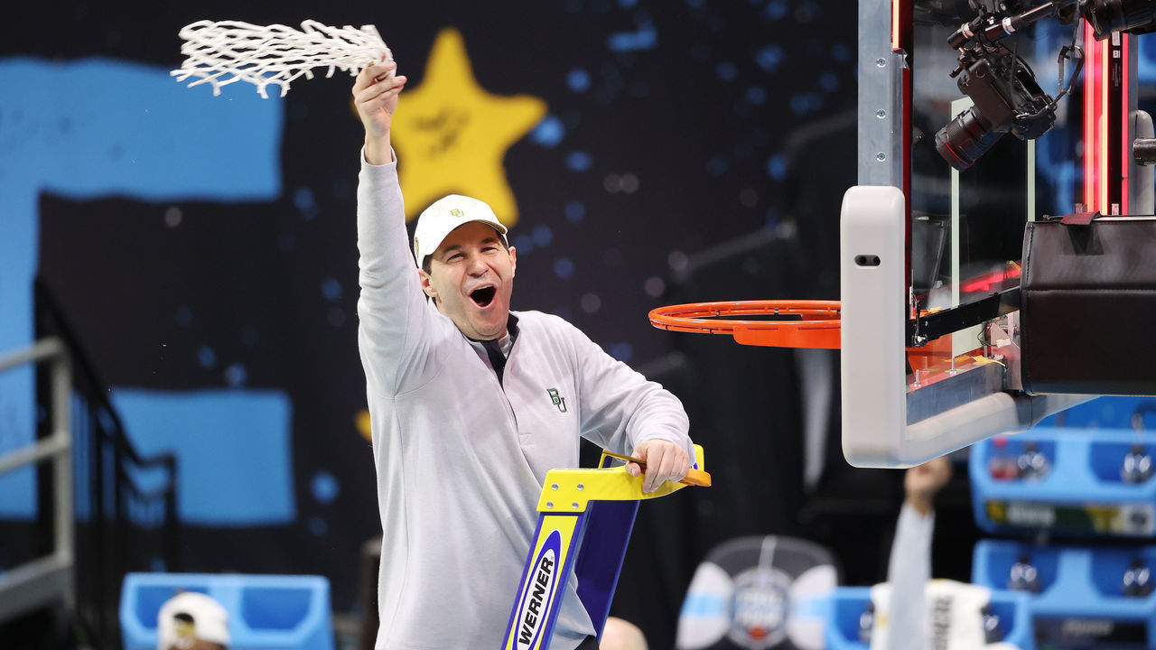 INDIANAPOLIS, INDIANA - APRIL 05: Head coach Scott Drew of the Baylor Bears cuts down the net after his team's win against the Gonzaga Bulldogs in the National Championship game of the 2021 NCAA Men's Basketball Tournament at Lucas Oil Stadium on April 05, 2021 in Indianapolis, Indiana.