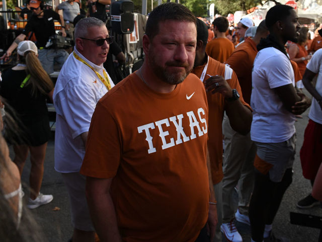 AUSTIN, TX - SEPTEMBER 18: New Texas Longhorn basketball head coach Chris Beard wanders Bevo Boulevard outside the stadium prior to start of game between the Rice Owls and the Texas Longhorns on September 18, 2021 at Darrell K Royal-Texas Memorial Stadium in Austin, TX.