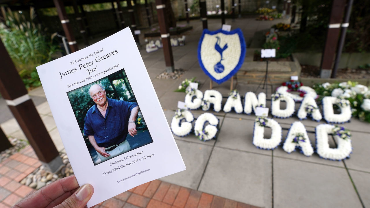 The order of service and floral tributes outside following the funeral at Chelmsford Crematorium. Former striker Jimmy Greaves died aged 81 on September 19th. He holds the record of 266 goals for Tottenham Hotspur, 357 goals in English top-flight football, and scored a record six hat-tricks for England. Picture date: Friday October 22, 2021.