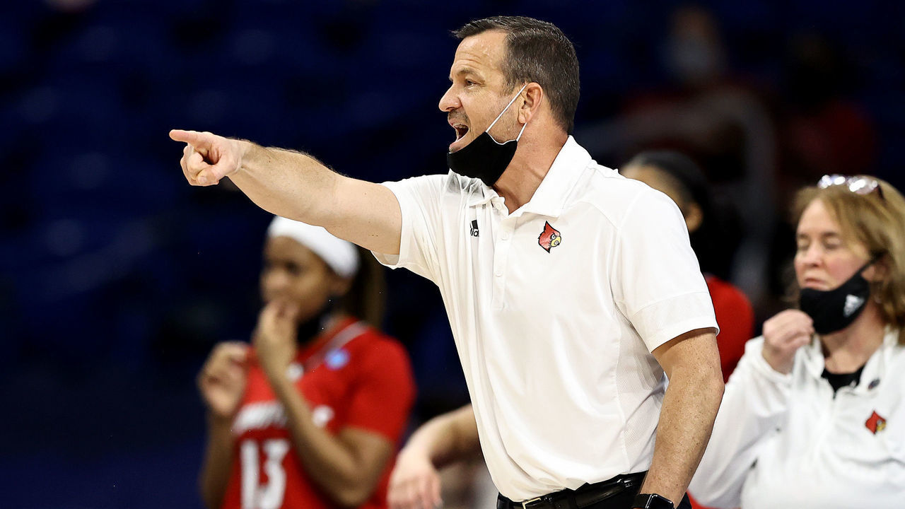 SAN ANTONIO, TEXAS - MARCH 30: Head coach Jeff Walz of the Louisville Cardinals directs his team in the second half against the Stanford Cardinal during the Elite Eight round of the NCAA Women's Basketball Tournament at Alamodome on March 30, 2021 in San Antonio, Texas.The Stanford Cardinal defeated the Louisville Cardinals 78-63 to advance to the Final Four.