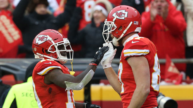 KANSAS CITY, MO - JANUARY 12: Kansas City Chiefs wide receiver Tyreek Hill (10) high fives tight end Travis Kelce (87) after Kelce drew a pass-interference call in the second quarter of an NFL Divisional round playoff game between the Houston Texans and Kansas City Chiefs on January 12, 2020 at Arrowhead Stadium in Kansas City, MO.
